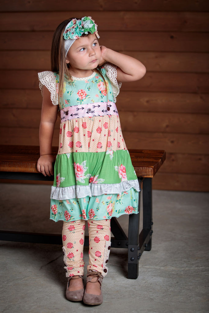Beautiful 2 piece outfit for girls sizes 2T-7T.  Dress can be worn alone or with leggins. Details of cap sleeves and lace, along with a unique design and soft hues.