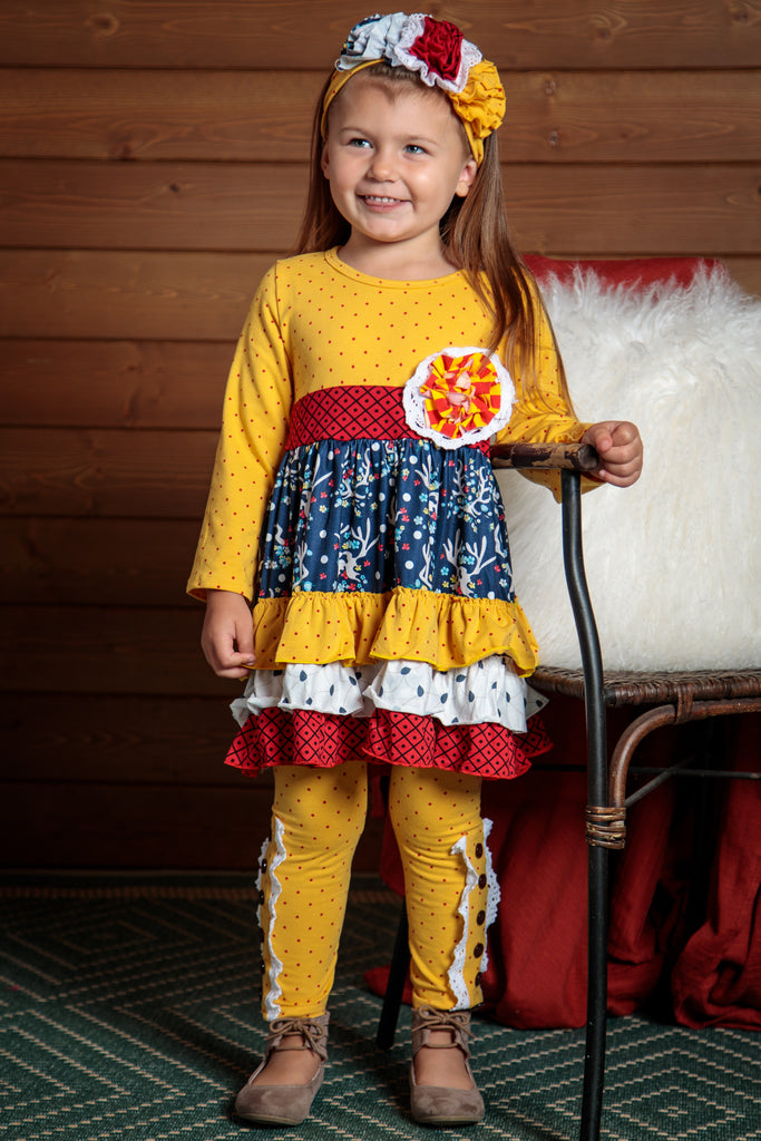 Bright, bold and fun 2 piece outfit.  Colors of yellow, red and blue for girls sizes 2t-7t. Headband included. 