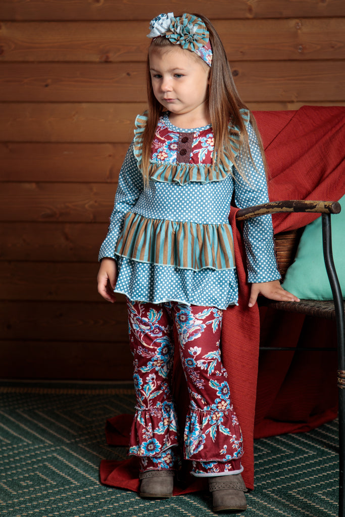 Burgundy and blue make up this top and pants outfit. Fun, 70s inspired flared leg bottoms and flowing top. Sizes 2T-7T.