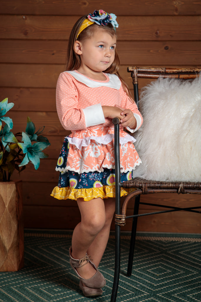 sweet 2 piece top and skirt outfit. so feminine with ruffles and polka dots. Sizes 2T-7T.