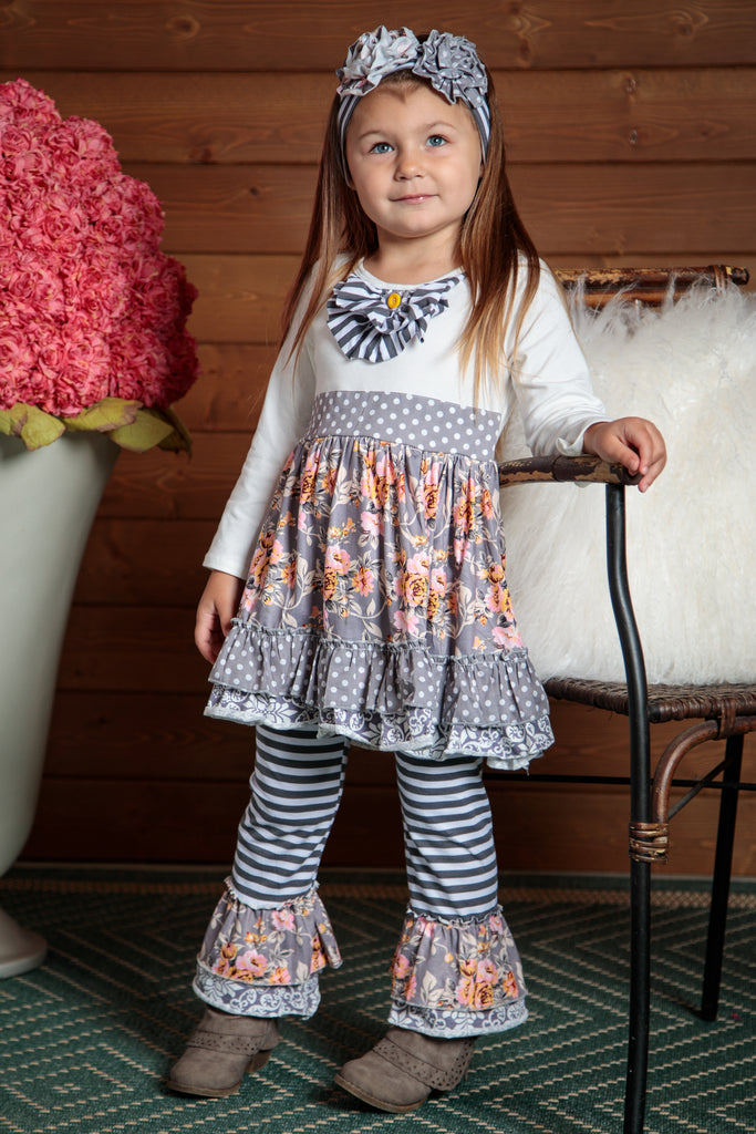Beautiful long sleeved top with striped ruffled pants. Flowing and elegant design. Sizes 2T-7T.